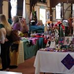 Some of the stallholders browsing before the doors open at Wild about Wool 2019, Poltimore House